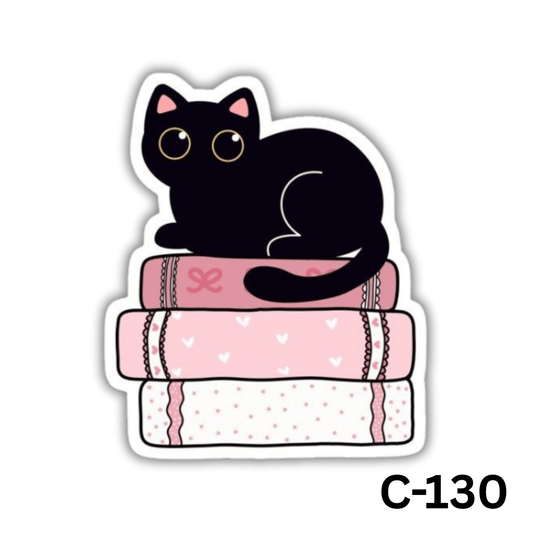Black cat sitting on books(C-130)